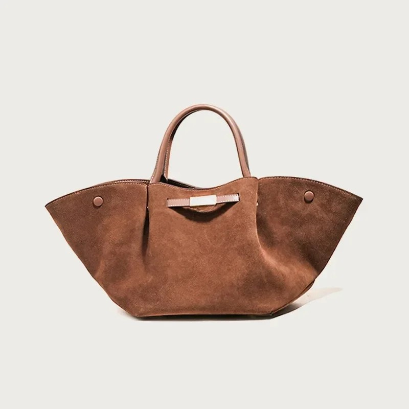 Tote bag dam i äkta kalvskinn med rymlig öppning och stadiga handtag