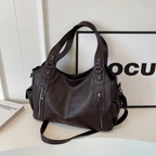 Axelväska dam crossbody med metalldetaljer och flera fack