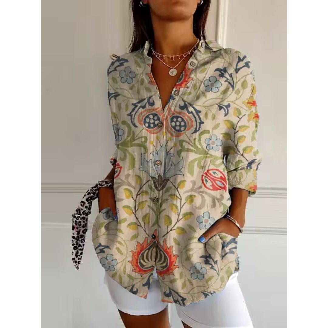 Blus dam med blommig print, långa ärmar och lös passform