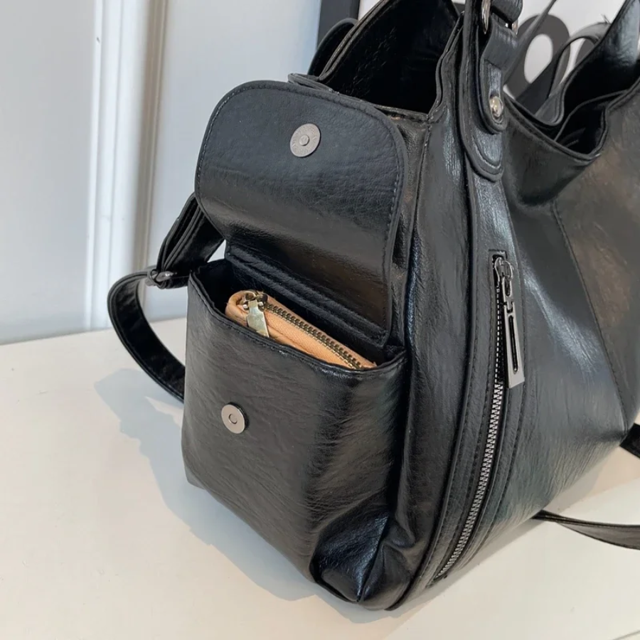 Axelväska dam crossbody med metalldetaljer och flera fack
