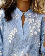 Blus dam blommig pastell med V-ringning och lätt andningsbart tyg