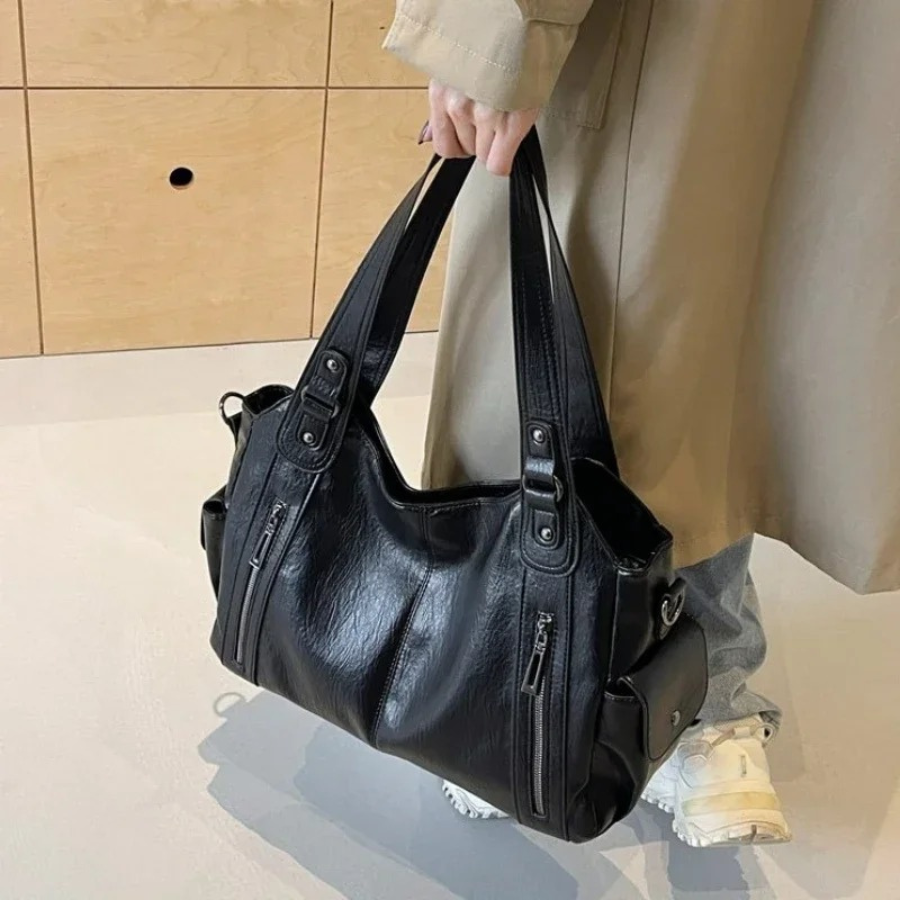 Axelväska dam crossbody med metalldetaljer och flera fack