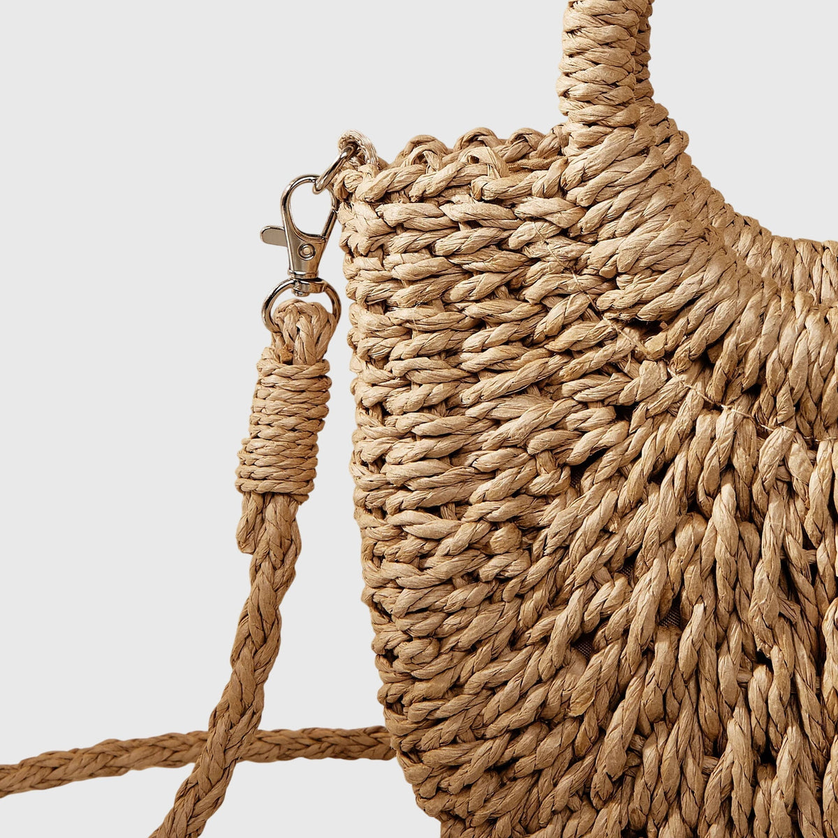 Handväska dam i naturlig stil med rundad silhuett och lätt design