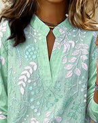 Blus dam blommig pastell med V-ringning och lätt andningsbart tyg
