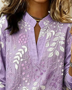 Blus dam blommig pastell med V-ringning och lätt andningsbart tyg