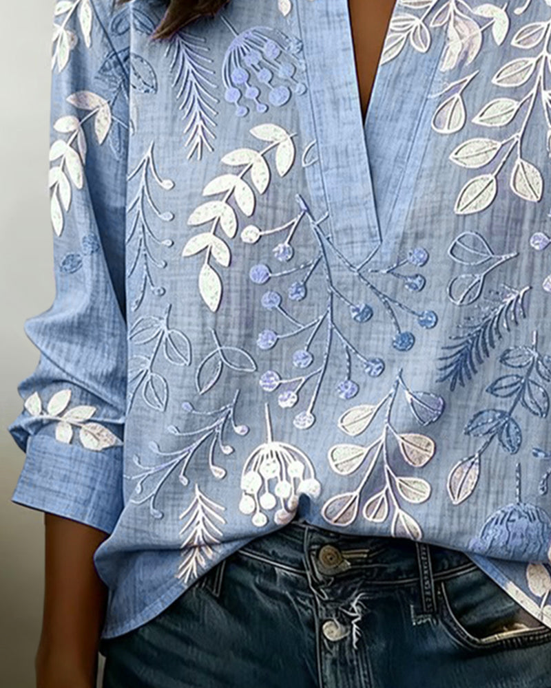 Blus dam blommig pastell med V-ringning och lätt andningsbart tyg
