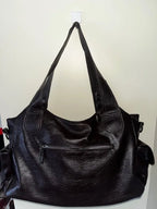 Crossbody väska dam med mjuk form och lång axelrem