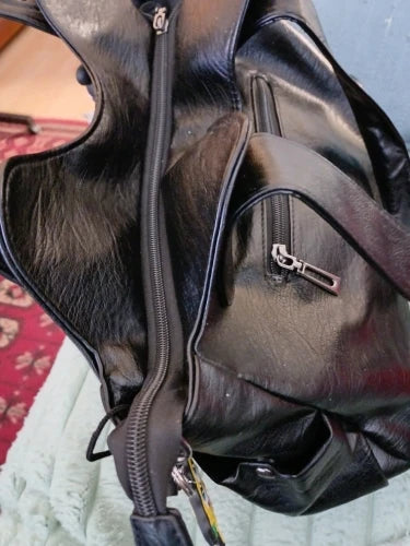 Crossbody väska dam med mjuk form och lång axelrem