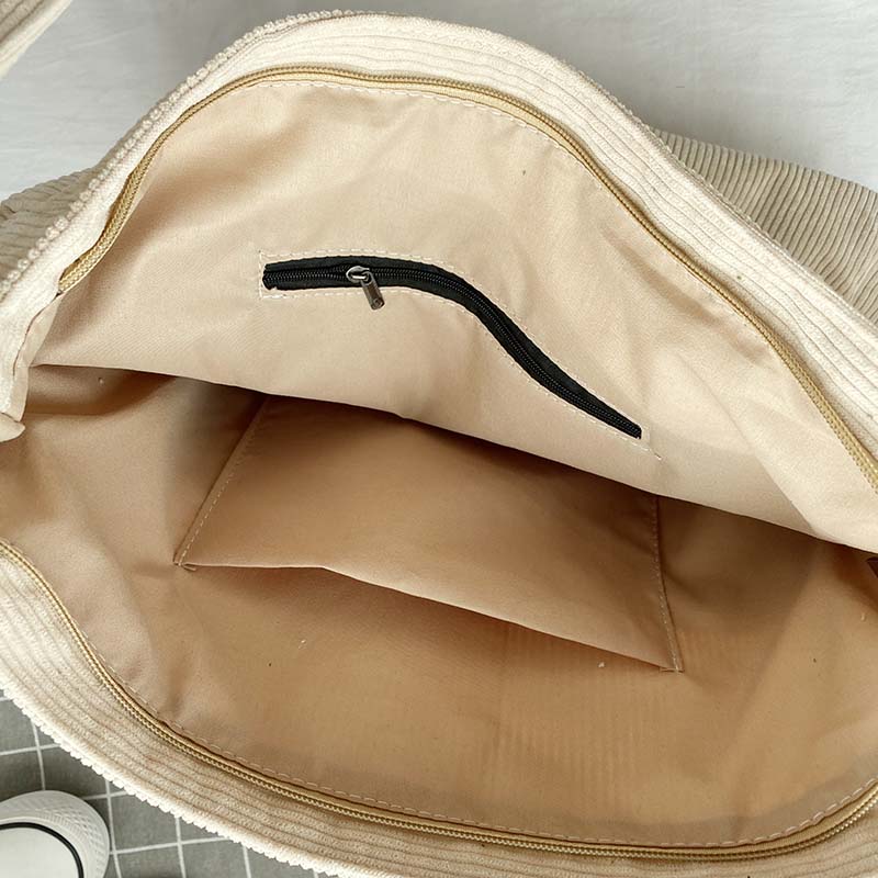 Crossbody väska dam i ribbad manchester med vintage stil och stort huvudfack