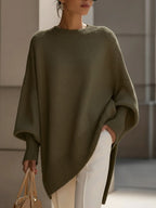 Stickad tröja dam oversize med asymmetrisk fåll och ribbade muddar