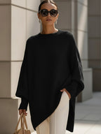 Stickad tröja dam oversize med asymmetrisk fåll och ribbade muddar