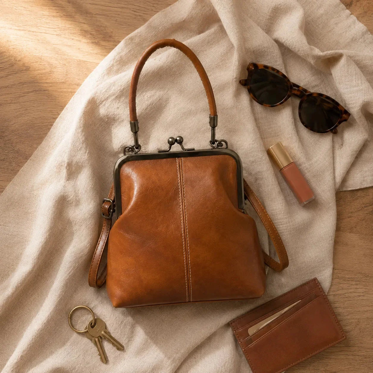 Crossbody väska dam vintage med handtag och kiss lock-lås