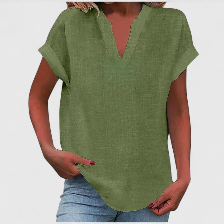 Blus dam kortärmad med V ringad hals och texturerad yta