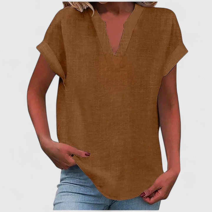 Blus dam kortärmad med V ringad hals och texturerad yta