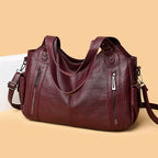 Crossbody väska dam med mjuk form och lång axelrem