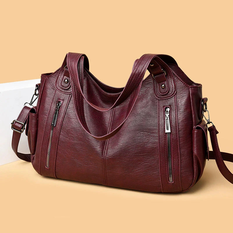 Crossbody väska dam med mjuk form och lång axelrem