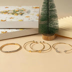 Julkalender smycken dam i guldfärg med örhängen och halsband