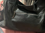 Crossbody väska dam med mjuk form och lång axelrem