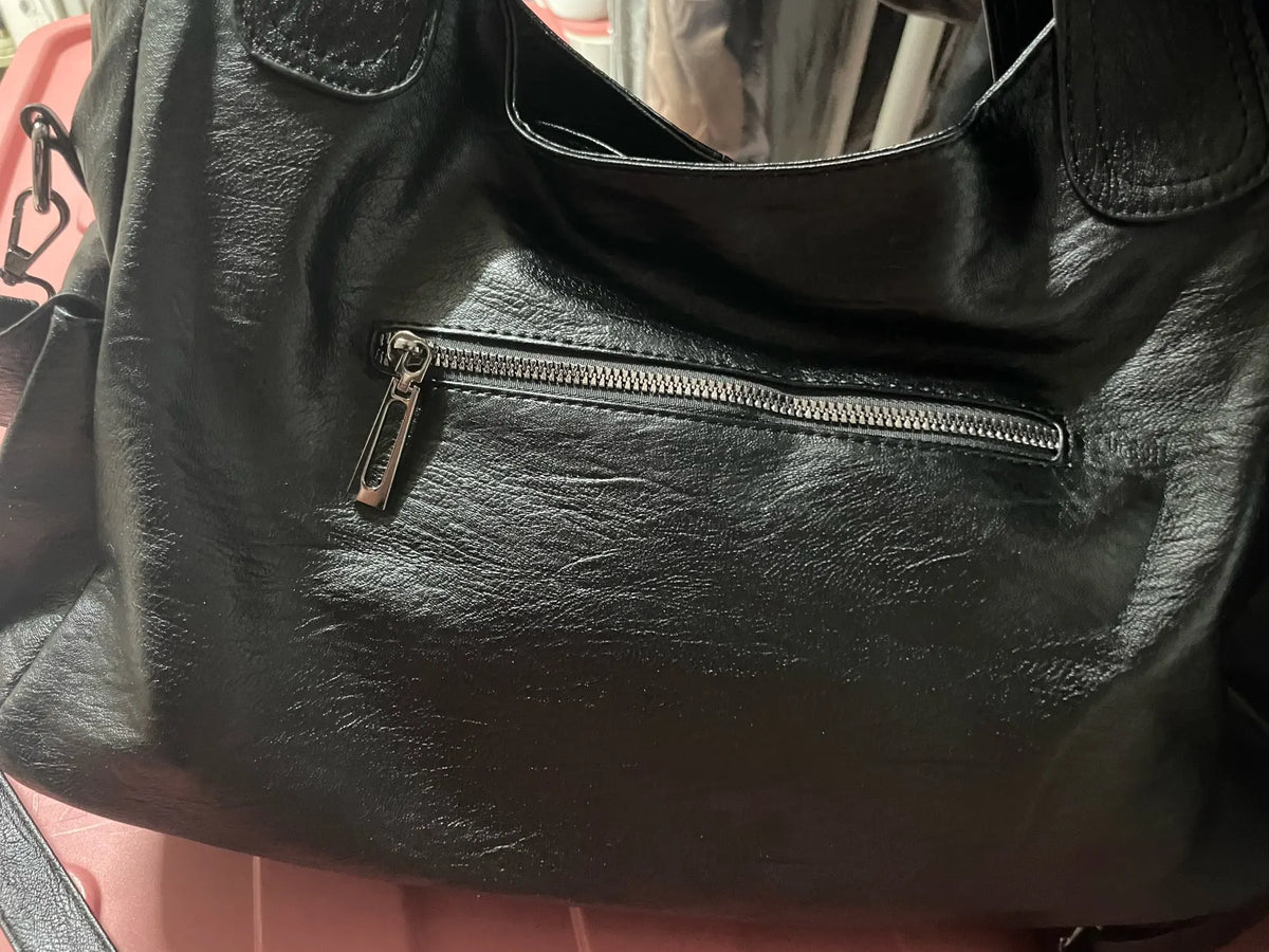 Crossbody väska dam med mjuk form och lång axelrem