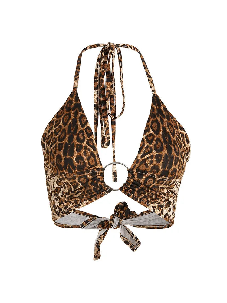 Paljettblus dam leopardmönstrad crop top med halterhals och metalldetalj