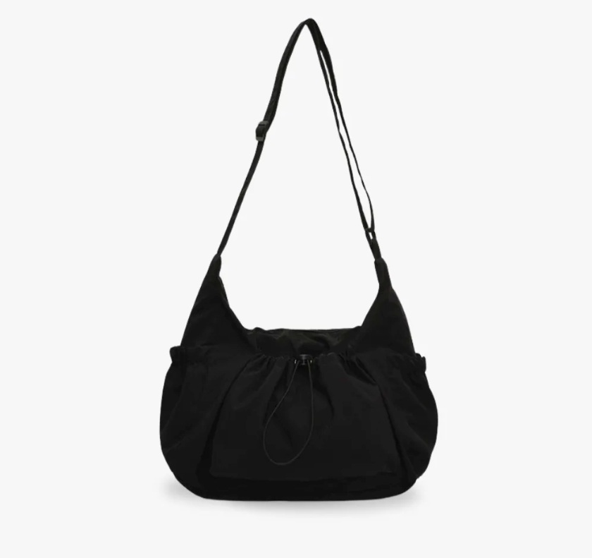 Crossbody väska dam med laptopfack och flera fickor