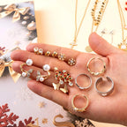Julkalender smycken med örhängen, halsband och armband, blommig design