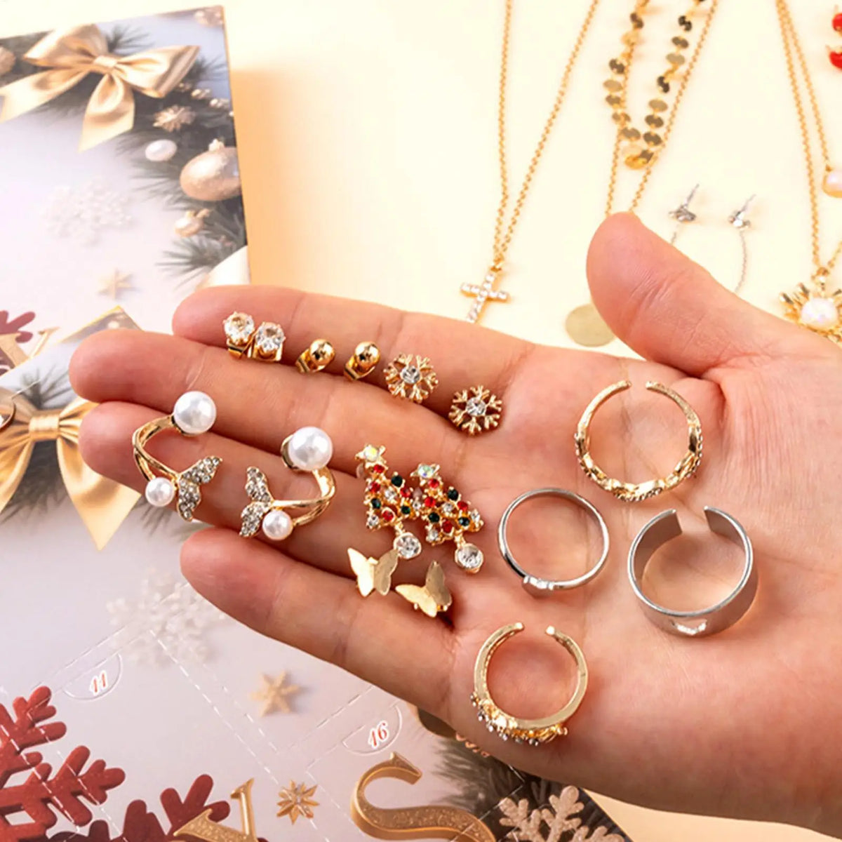 Julkalender smycken med örhängen, halsband och armband, blommig design