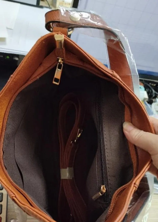 Läderväska dam i äkta skinn med vintage stil och justerbar axelrem