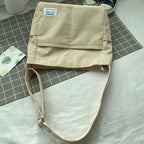 Crossbody väska dam i ribbad manchester med vintage stil och stort huvudfack