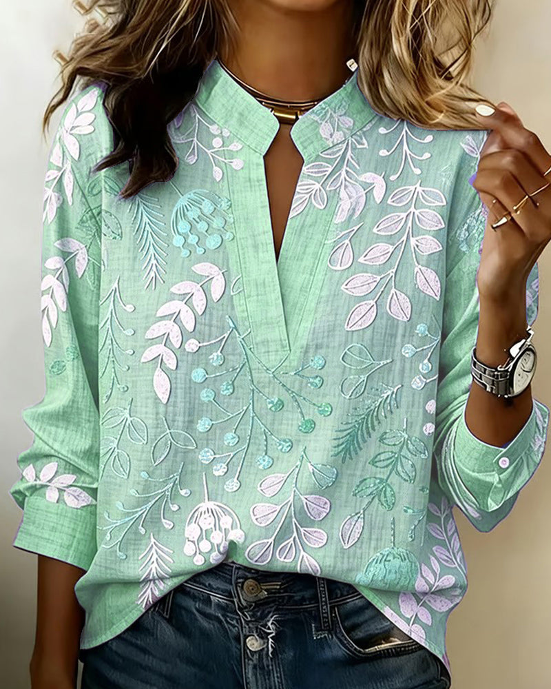 Blus dam blommig pastell med V-ringning och lätt andningsbart tyg
