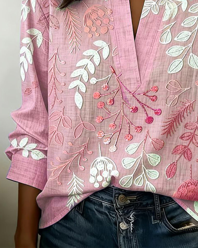 Blus dam blommig pastell med V-ringning och lätt andningsbart tyg