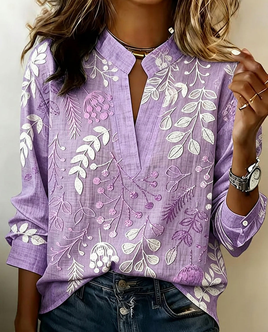 Blus dam blommig pastell med V-ringning och lätt andningsbart tyg