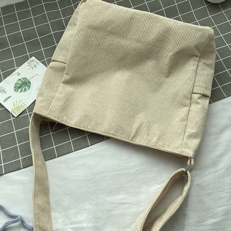 Crossbody väska dam i ribbad manchester med vintage stil och stort huvudfack