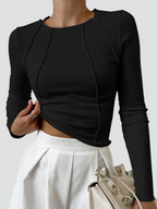 Blus dam ribbstickad långärmad crop top med tajt passform