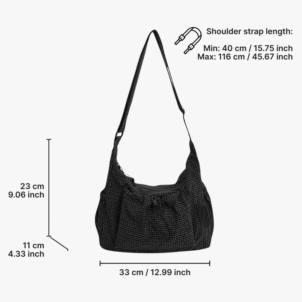 Crossbody väska dam med laptopfack och flera fickor