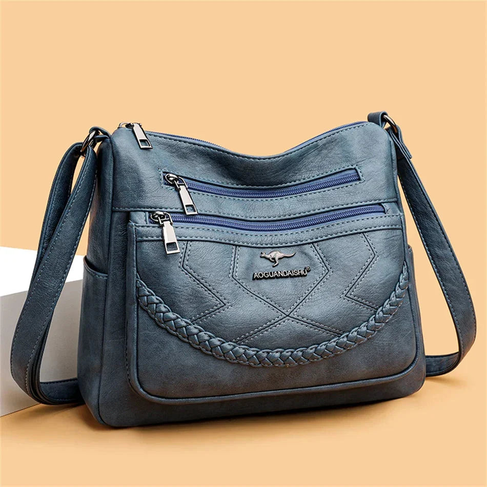 Crossbody väska dam i mjukt läder med justerbar axelrem