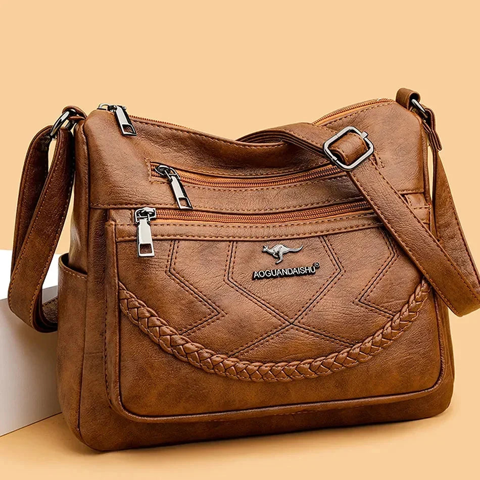 Crossbody väska dam i mjukt läder med justerbar axelrem