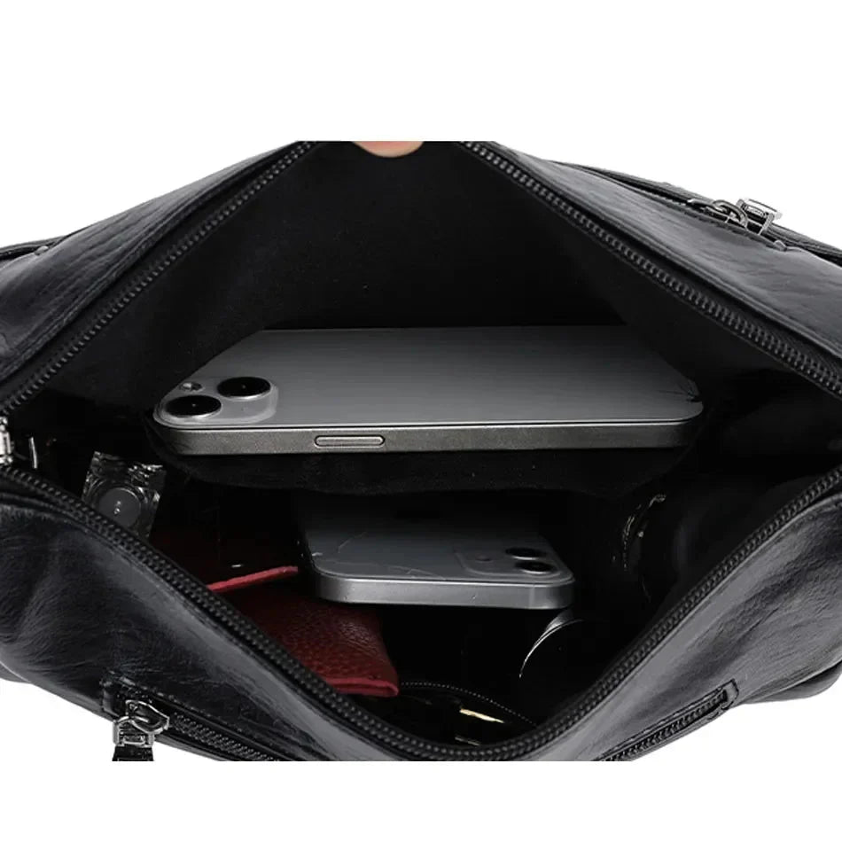 Crossbody väska dam i mjukt läder med justerbar axelrem