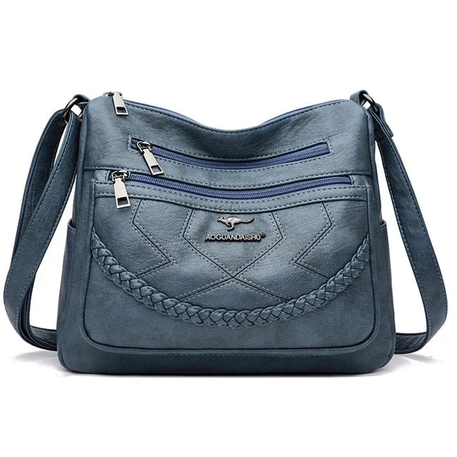 Crossbody väska dam i mjukt läder med justerbar axelrem