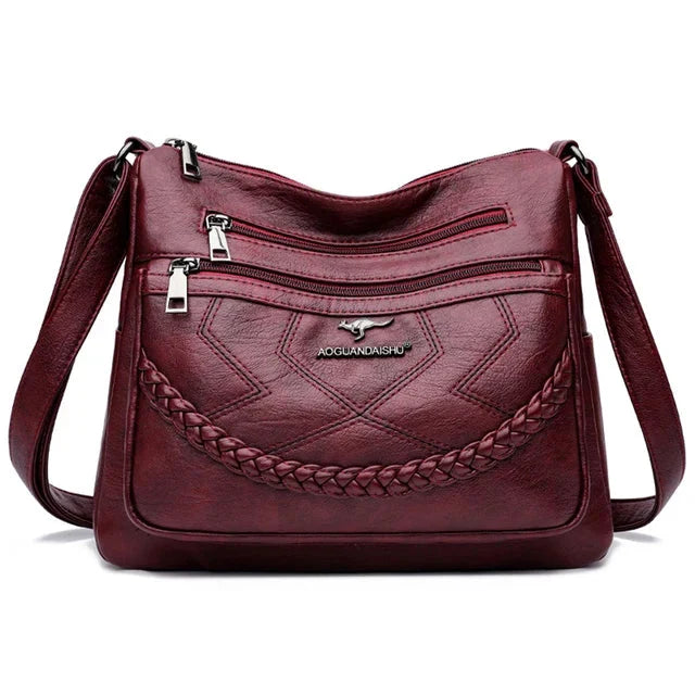 Crossbody väska dam i mjukt läder med justerbar axelrem