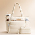 Tote bag dam i puffer-look med stort innerfack och sidofack